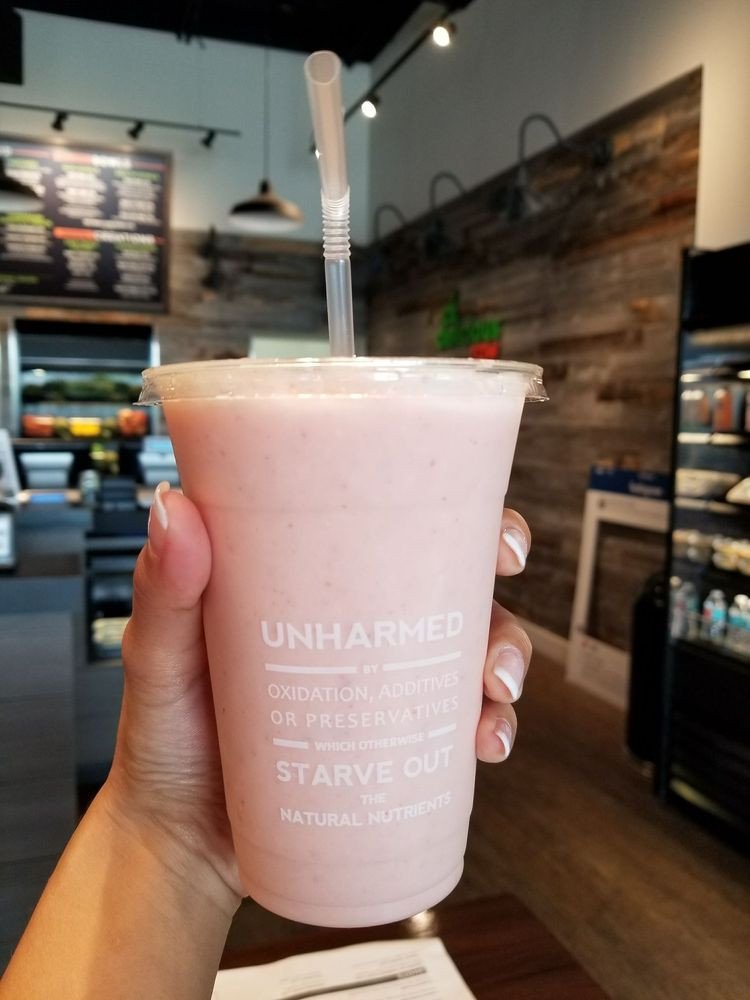 24 oz compostable cold cup in foodservice setting