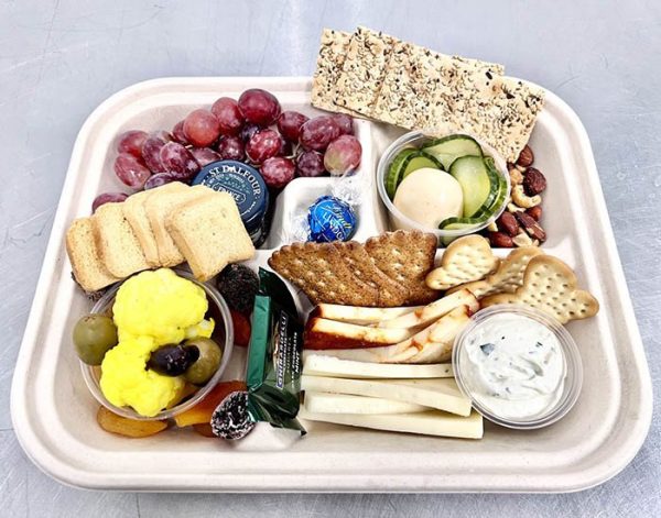 Compostable fiber bento box in foodservice setting